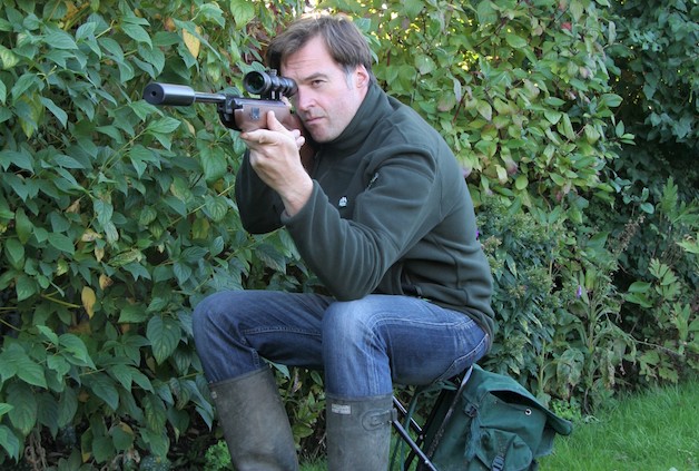 man with air rifle