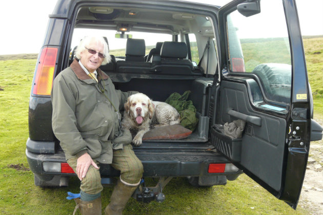 Clumber spaniel with owner 