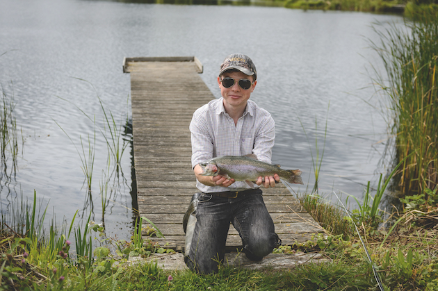 Fisherman with trout