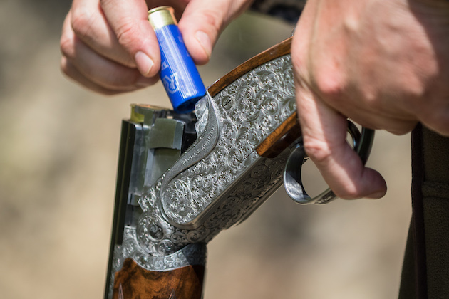 How should you deal with a cartridge misfire?