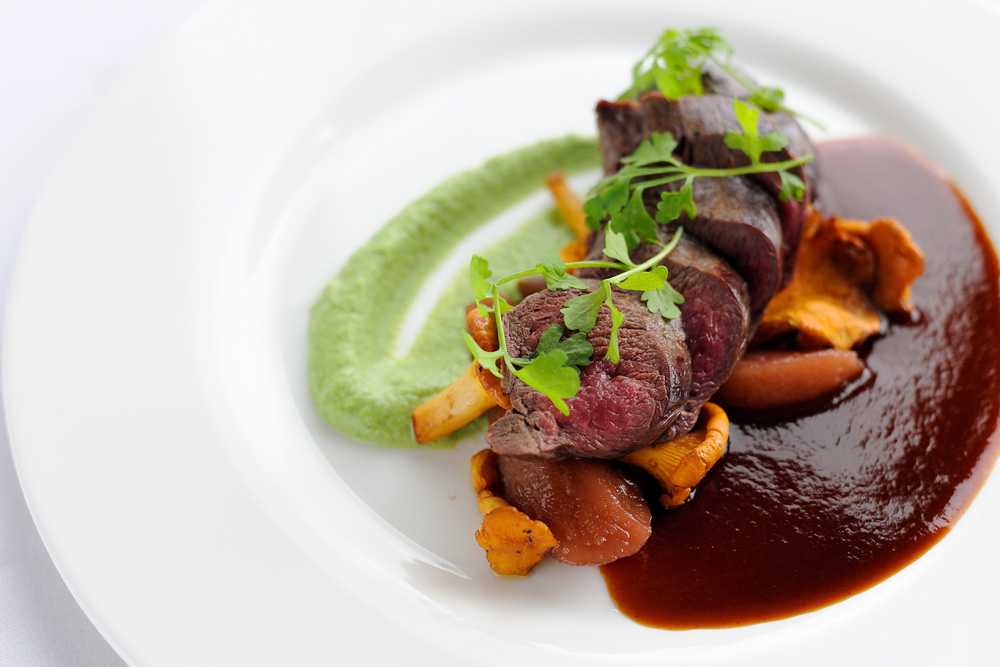 Loin of venison with broccoli and stilton purée and red wine sauce