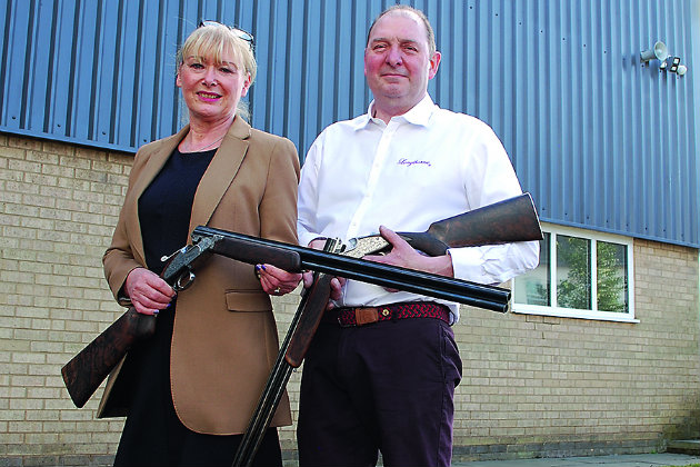 man and woman gun manufacturers 