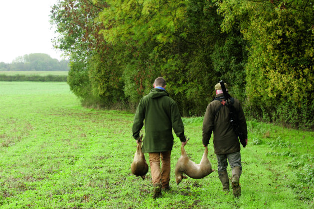 deerstalkers with deer