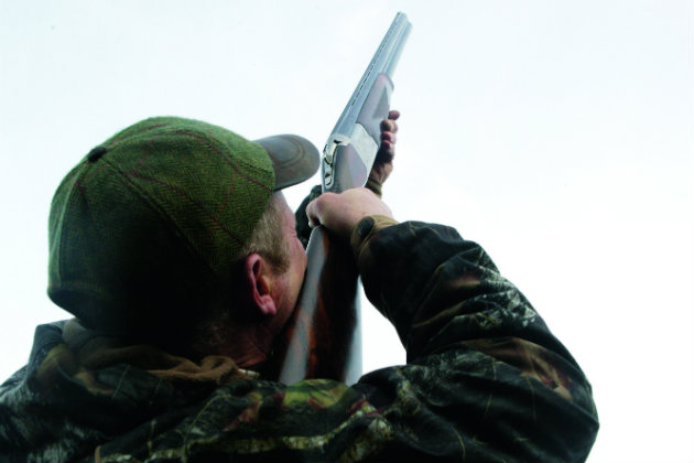 man shooting 