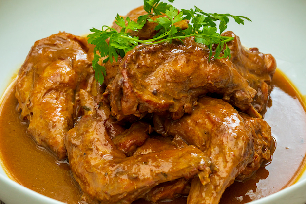 Rabbit with garlic, thyme and white wine, served with olive oil twice-cooked fries