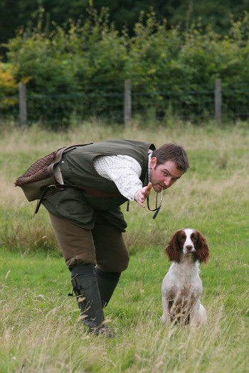 How can I improve my spaniel’s retrieving skills?