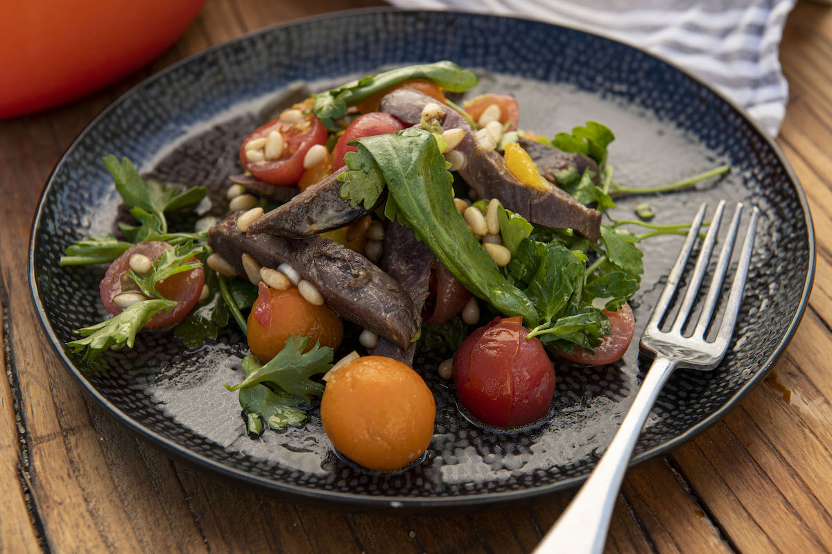 Pan-fried pigeon and orange salad