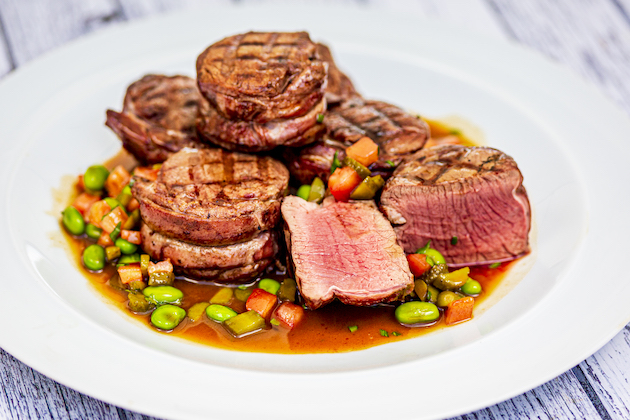 Grilled rosettes of venison, chasseur and soya bean sauce