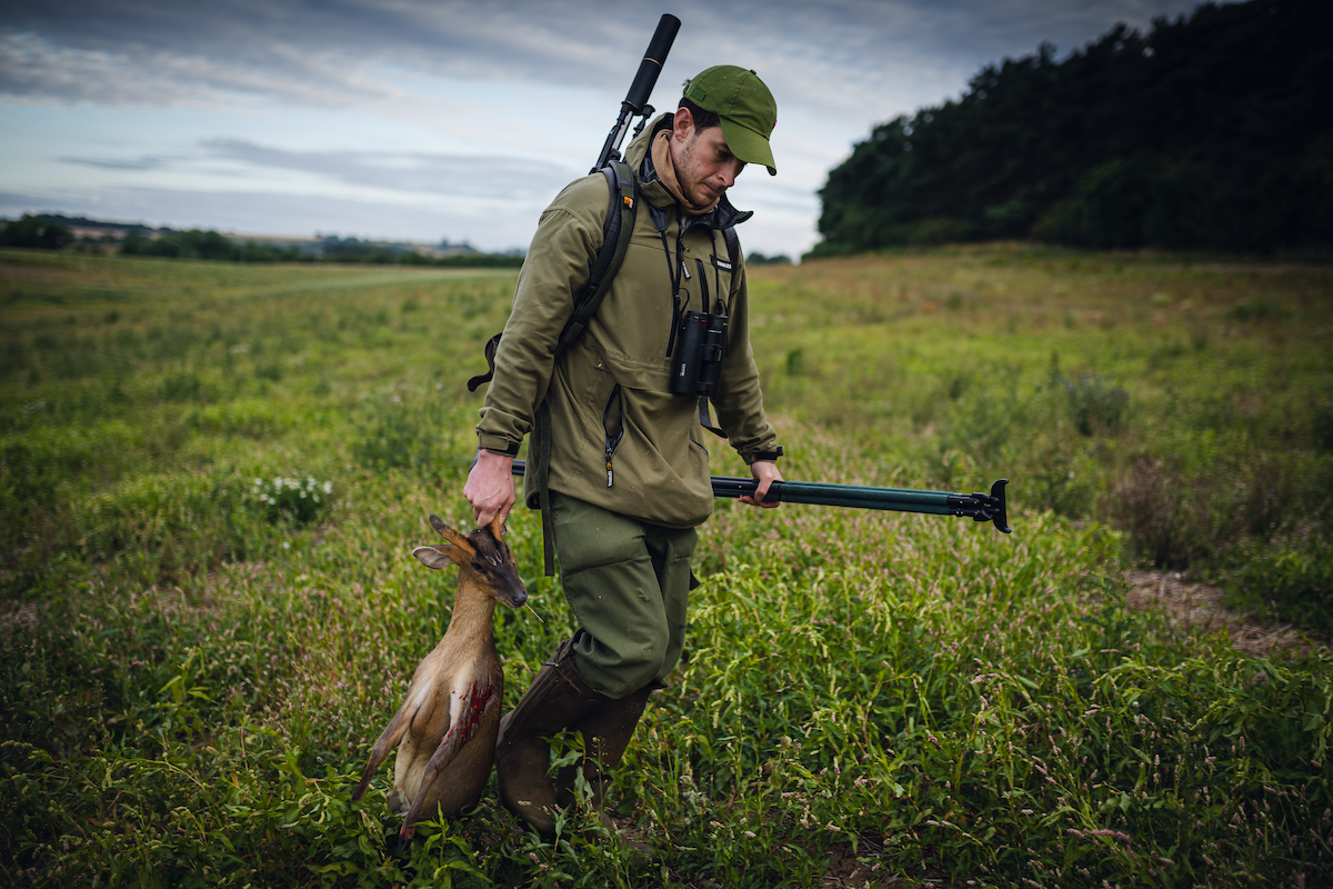 Stalker with dead muntjac