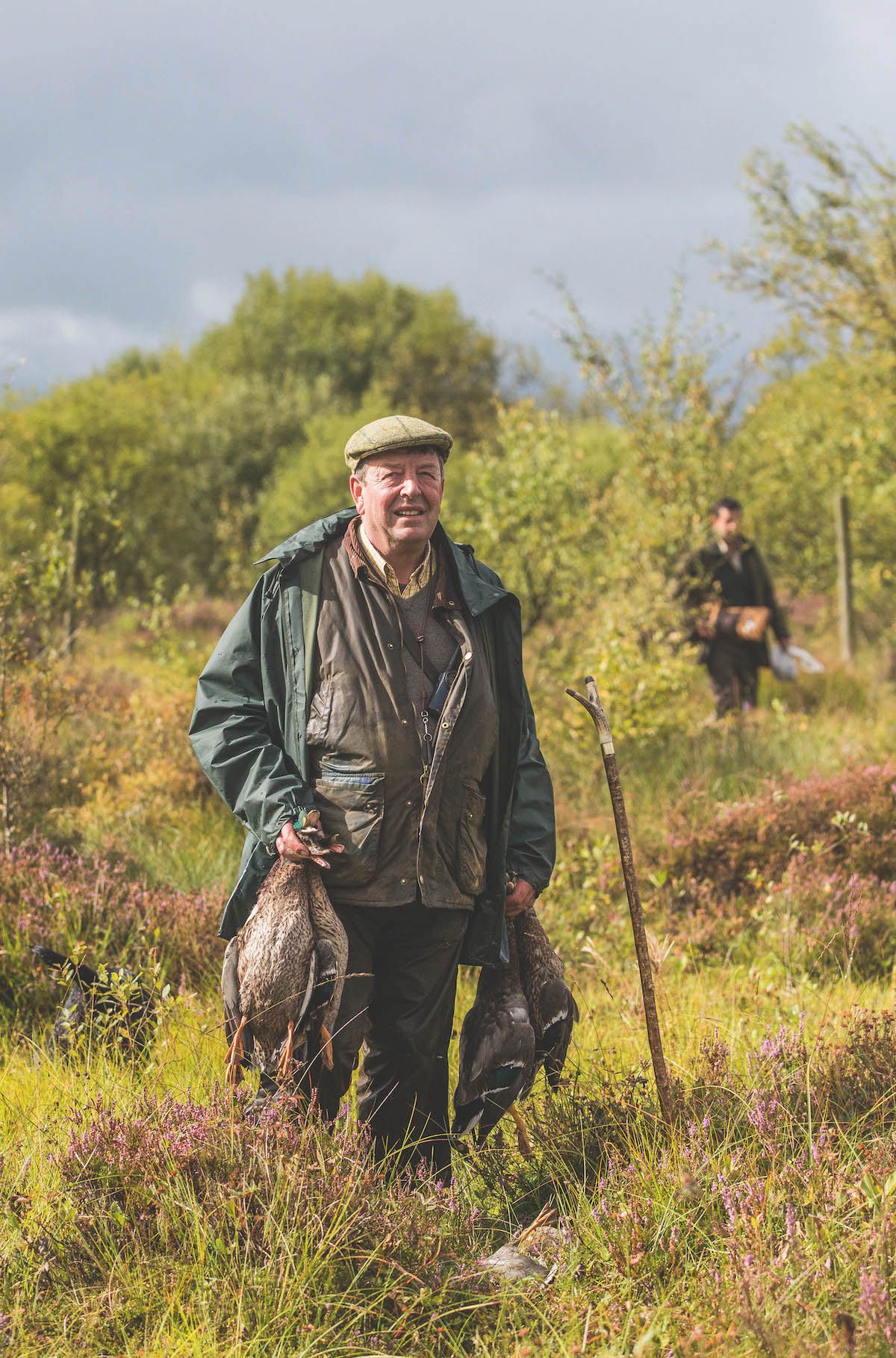 beater with pheasant 