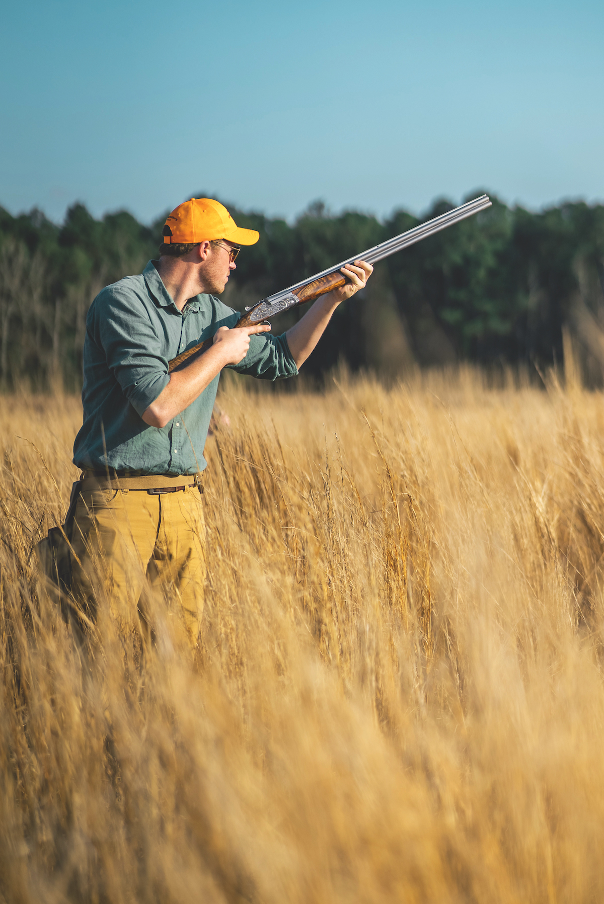 man shooting shotgun in USA 
