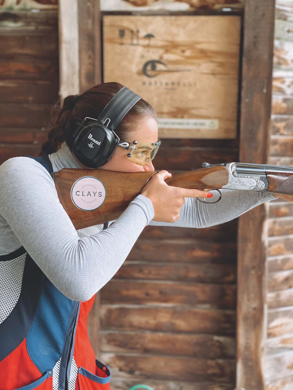 female clay shooter