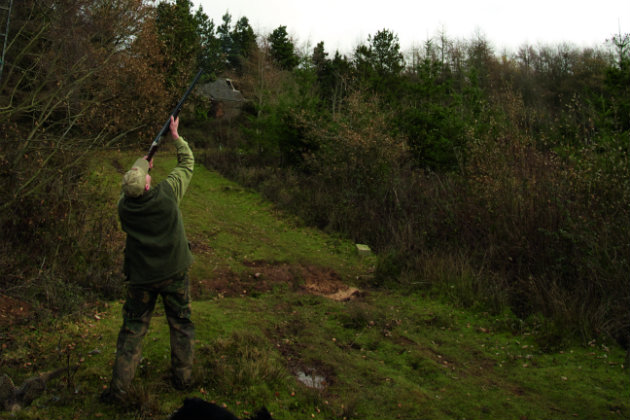 man shooting 