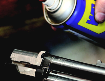 Does WD40 attack the metal on guns?