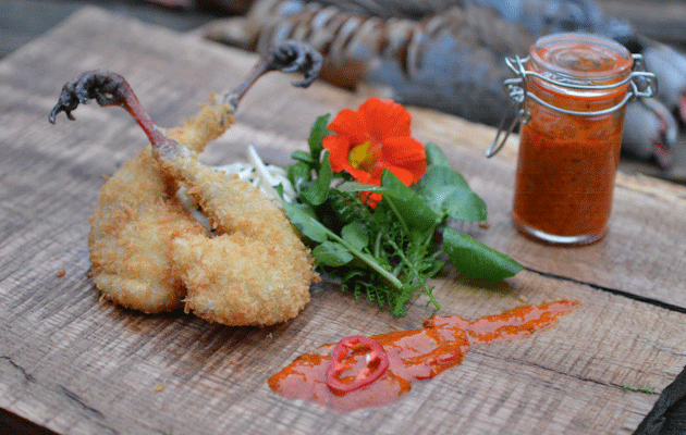 Deep-fried partridge legs with piri piri hot sauce