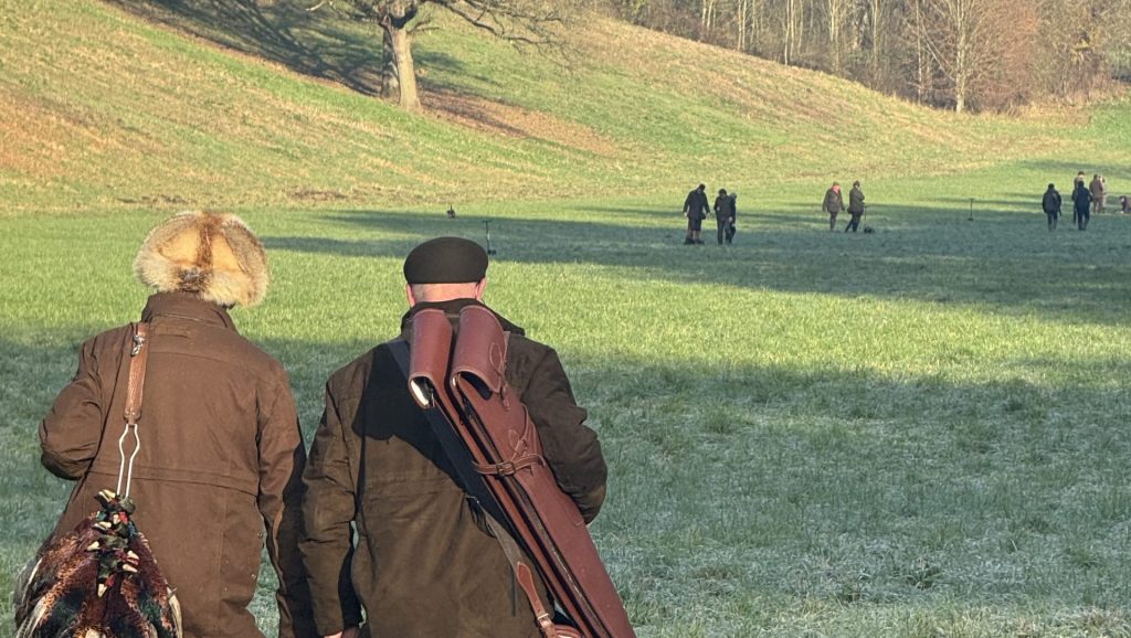 A team of guns walking to their pegs 