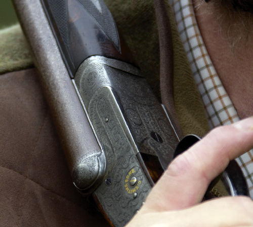Why do re-sleeved antique shotguns command a lower price?