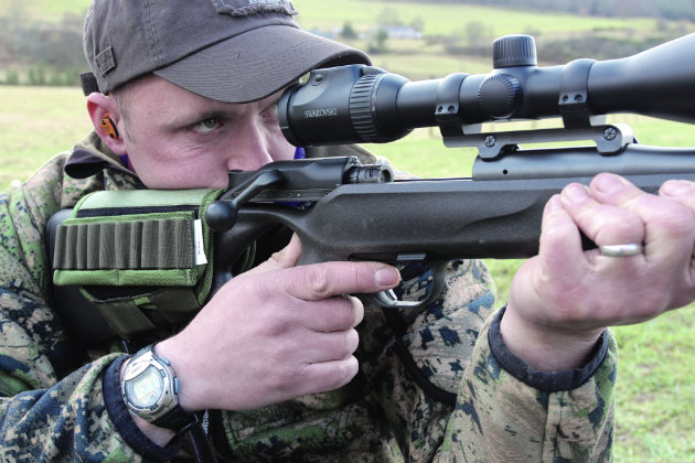man holding rifle
