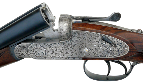  /></noscript></p>
<p>The lock style is regarded as highly desirable and the ejectors are of the Southgate type.</p>
<p><strong><em>ON TEST</em></strong><br />
At 6lb this is certainly a light enough gun, sensibly chambered for 2.3⁄4in (70mm) cartridges. The actual point of balance is right at the front edge of the cross pin (where the barrel hinges), meaning handling is potentially very fast.</p>
<p>This is aided by the lightweight; however, the 28in barrels give good pointability and impart a degree of steadiness that provides a reassuring feel.</p>
<p>Whether carried in a gunslip or broken empty over the arm, this slim gun is no burden at all and a good bet for the walking Gun.</p>
<p>Around the hedges on the way to the testing field, looking for the occasional pheasant or waiting expectantly while the dogs fussed around the bushes hoping for a rabbit, the No.2 felt like an extension of oneself.</p>
<p>I was itching to try it for real but it did not happen.</p>
<p>At the pattern plate a variety of cartridges were used, the main diet consisting of Eley Hi-Flyer 28g loads, Lyalvale Express 25g loads and Gamebore Pure Gold 30g loads.</p>
<p>The last I expected to be a bit snappy in this light gun, but the combination of this cartridge and a good-fitting gun was remarkably pleasant to shoot.</p>
<p>Everything functioned as it should, with good trigger pulls, positive ejection and a short-throw safety button that is a delight to use.</p>
<p>Patterns with any cartridge and combination of choke ranged from very acceptable to good, with a tendency to throw the centre of the pattern just slightly high to point of aim.</p>
<p>So, is it a mere imitation No.1?</p>
<p>Far from it the No.2 de Luxe has its own character and style, which I think will become appreciated as a worthy addition to the AYA range.</p>
<p><strong><em>CONCLUSION</em></strong><br />
Most certainly English in all but name. A genuine lightweight game gun that is a delight to handle and shoot.</p>
<p>It incorporates all the features one expects on a good quality sidelock. This is the type of gun that is likely to appeal to the real enthusiast who is also a good, competent Shot.</p>
<p>Like any thoroughbred, the owner has to rise to the occasion and fully appreciate it, and really be able to use it to its best advantage.</p>
                    </div>
                </div>
                <div class=