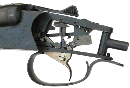  /></noscript></p>
<p>The finish, by comparison, has never been a strong point: the barrels on this gun, for example, exhibit signs of machine polishing on the outside over some fairly basic striking up.</p>
<p>Internally, where it matters, it is a completely different story and it has beautifully straight chrome-lined bores.</p>
<p>This is what one tends to find with Baikals. The bits that really matter are done right; the rest just does the job. Another example of this is the matting on the broad and chunky raised top rib.</p>
<p>It carries a fine and wiggly detailed pattern reminiscent of many pre-war Birmingham guns.</p>
<p>On this gun it seems a complicated, albeit attractive, way of producing a non-glare finish. The detail on the three short screw-in chokes is also good.</p>
<p>They are visibly marked up with their suitability for lead and steel shot; for example, a choke will be marked IC lead/IM steel.</p>
<p>If only lead appears on the choke it means it is not suitable for steel shot.</p>
<p>All carry the usual notch markings relating to the choke patterns normally produced with lead shot.</p>
<p>The proof pressure on this gun is not the same as superior proof, which means you should use the reduced load steel shot cartridges.</p>
<h2>Short stock</h2>
<p>In the handling department this gun proved to be a bit front-heavy, which is not surprising as the balance point is a good inch in front of the action cross-pin (where the barrels pivot).</p>
<div style=