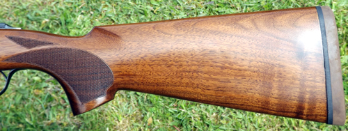  /></noscript></p>
<p>Even with the skeet choke it did the job well enough – as the belly of the clay was showing each time.</p>
<p><em><strong>CONCLUSION</strong></em><br />
If you?re looking for a starter gun for your 12-year-old son, daughter or even the little wife, this gun has to be looked at very seriously.</p>
<p>It?s as at home on the clay ground with 21g and 24g cartridges as it is in the field with 24g and 28g cartridges.</p>
<p>If, however, the gun user is of slight build I would recommend the use of 24g loads at the most.</p>
<p>Would I personally buy one?</p>
<p>For my grandson in a few years time? definitely, it?s now on my list.</p>
<p><em><strong>TECHNICAL SPECIFICATIONS</strong></em><br />
<em>Made in:</em><br />
Spain<br />
<em>Action:</em><br />
Alloy action with floral scrolling, steel cocking bars in floor and twin locking lugs on the action walls.<br />
<em>Switches:</em><br />
Auto safety and barrel selector.<br />
<em>Barrels:</em><br />
Over-under 28-inch. Ejector. Internally chromed. 76mm chambers, 6mm ventilated Rib.<br />
<em>Length of pull:</em><br />
Stock = 15inches inc. rubber butt pad.<br />
<em>Chokes:</em><br />
5 supplied, SK, ¼, ½, ¾, Full. Steel proof.<br />
<em>Trigger:</em><br />
Gold plate.<br />
<em>Wood to metal fit:</em><br />
Good for the budget.<br />
<em>Wood grade:</em><br />
Mainly plain with some dark graining but quite pleasant.<br />
<em>Weight:</em><br />
5½ lbs.</p>
<h3>Lanber 20-bore Field shotgun</h3>
<p><strong>Price £795</strong></p>
<h2><a href=