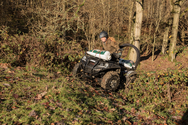 quad bike on muddy ground 