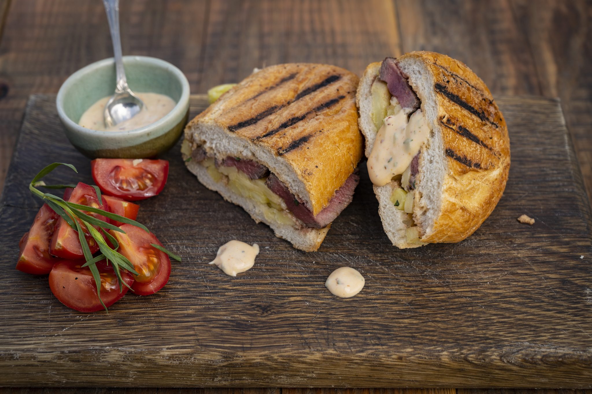 Venison steak, cheese and chips baguette toastie