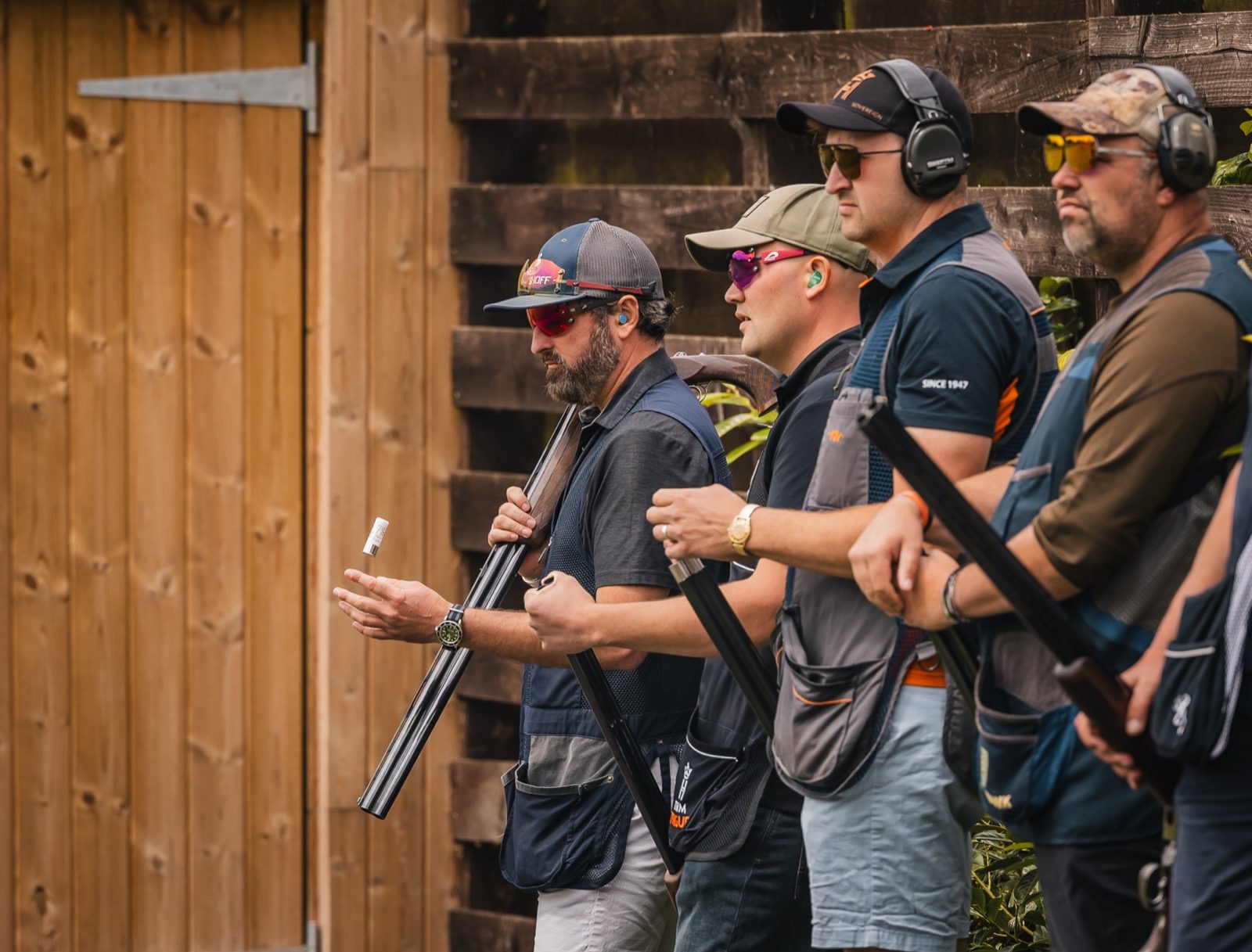 AAA-class clay shooters waiting to shoot at the Eaton Hall TopGun