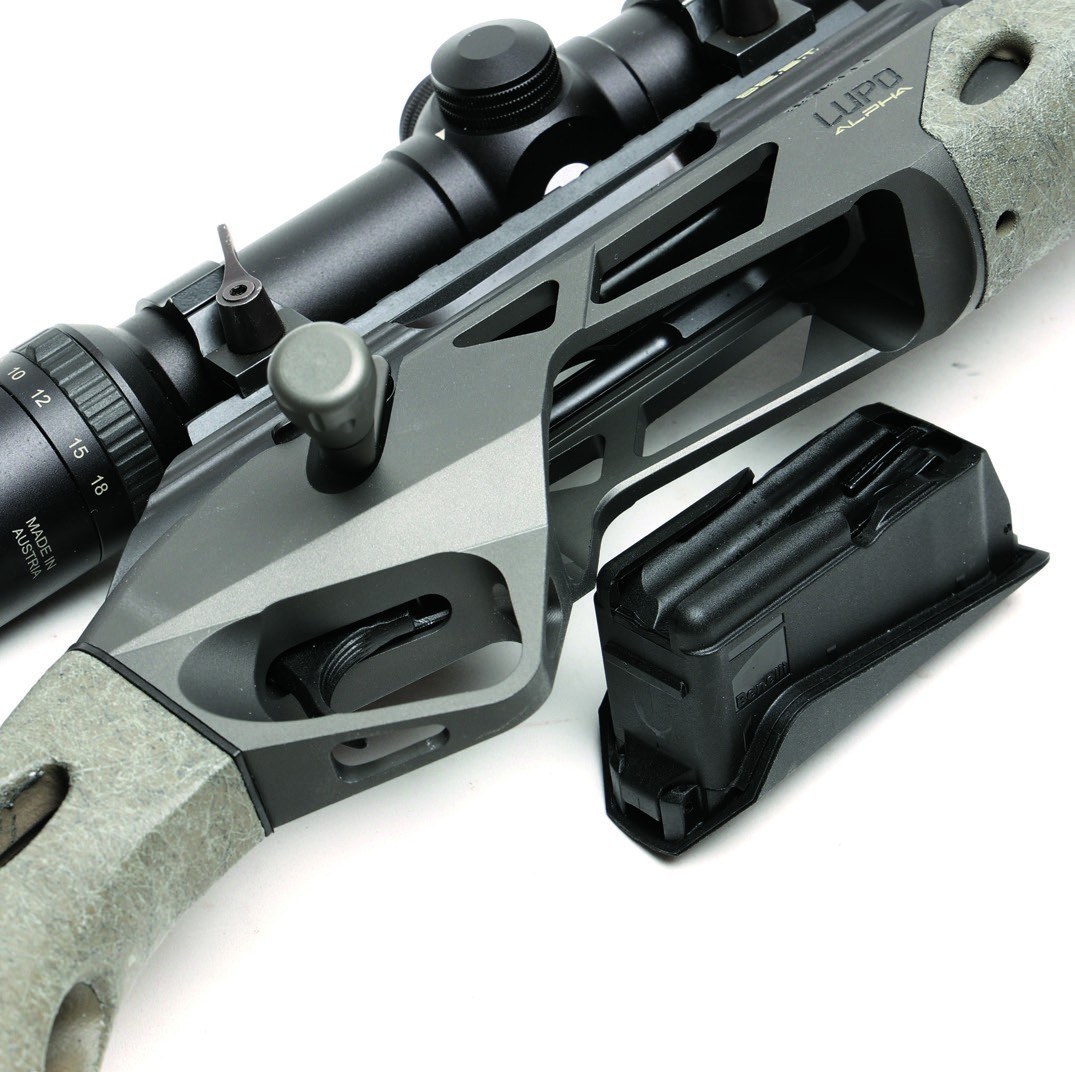Benelli Lupo Alpha action and five-shot polymer magazine removed, showing bolt and Picatinny rail detail