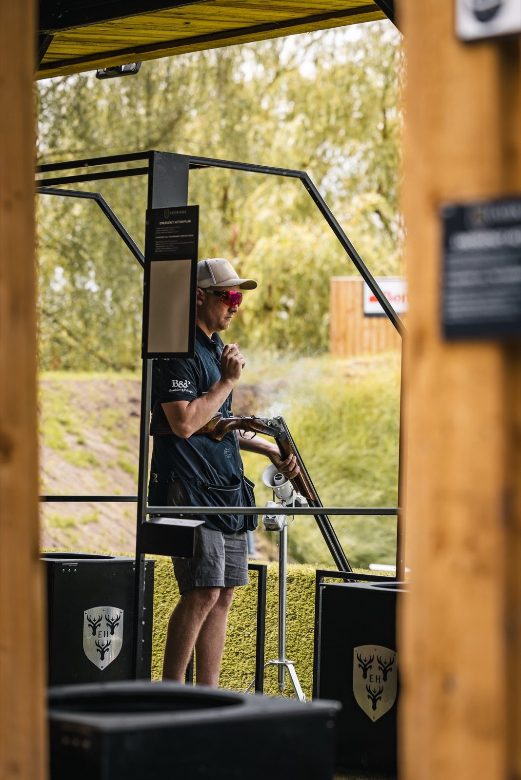 Clay shooter in a Sportrap cage at the Eaton Hall TopGun