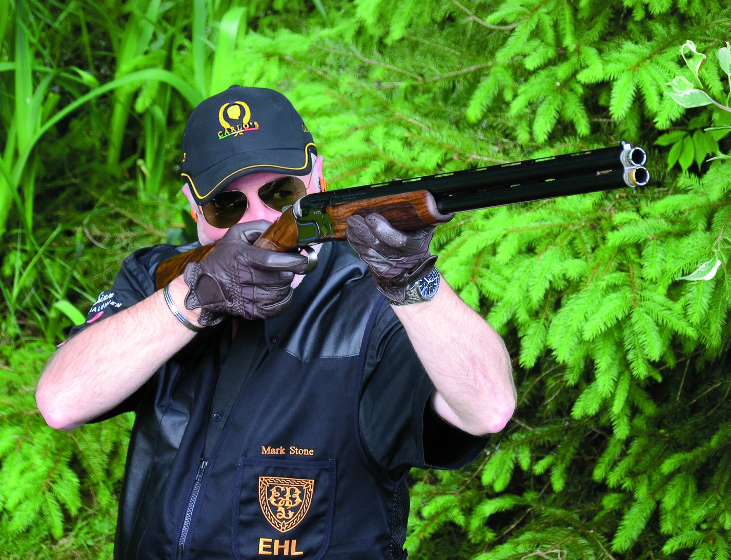 Mark Stone shooting the Beretta DT11 Sporting in a woodland Sporting layout