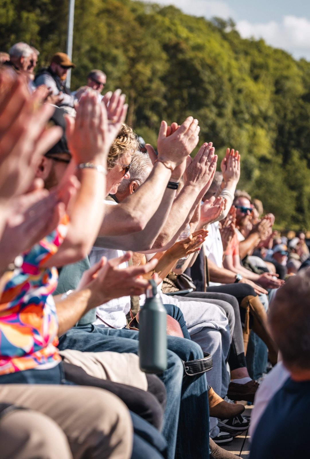 Crowd applauding from the grandstand at the Eaton Hall TopGun Super Final