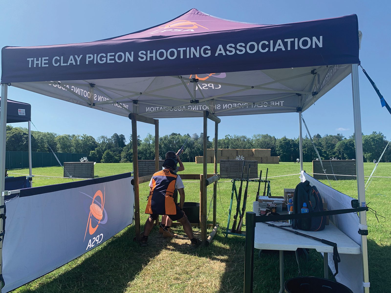 CPSA have-a-go clay line stand under a gazebo at a country show