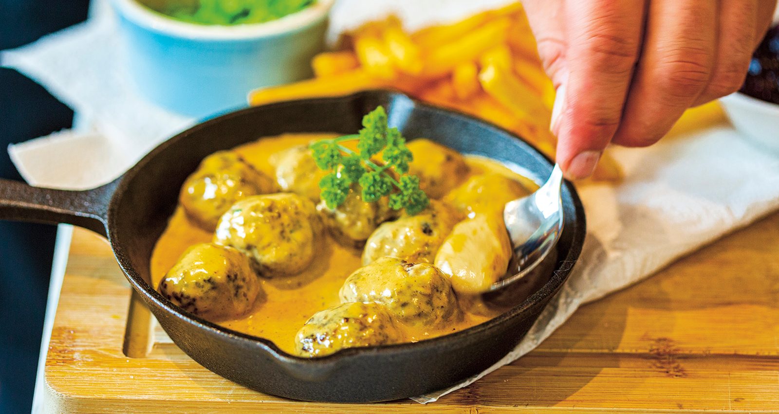 Scandinavian venison meatballs in a creamy sauce with chips