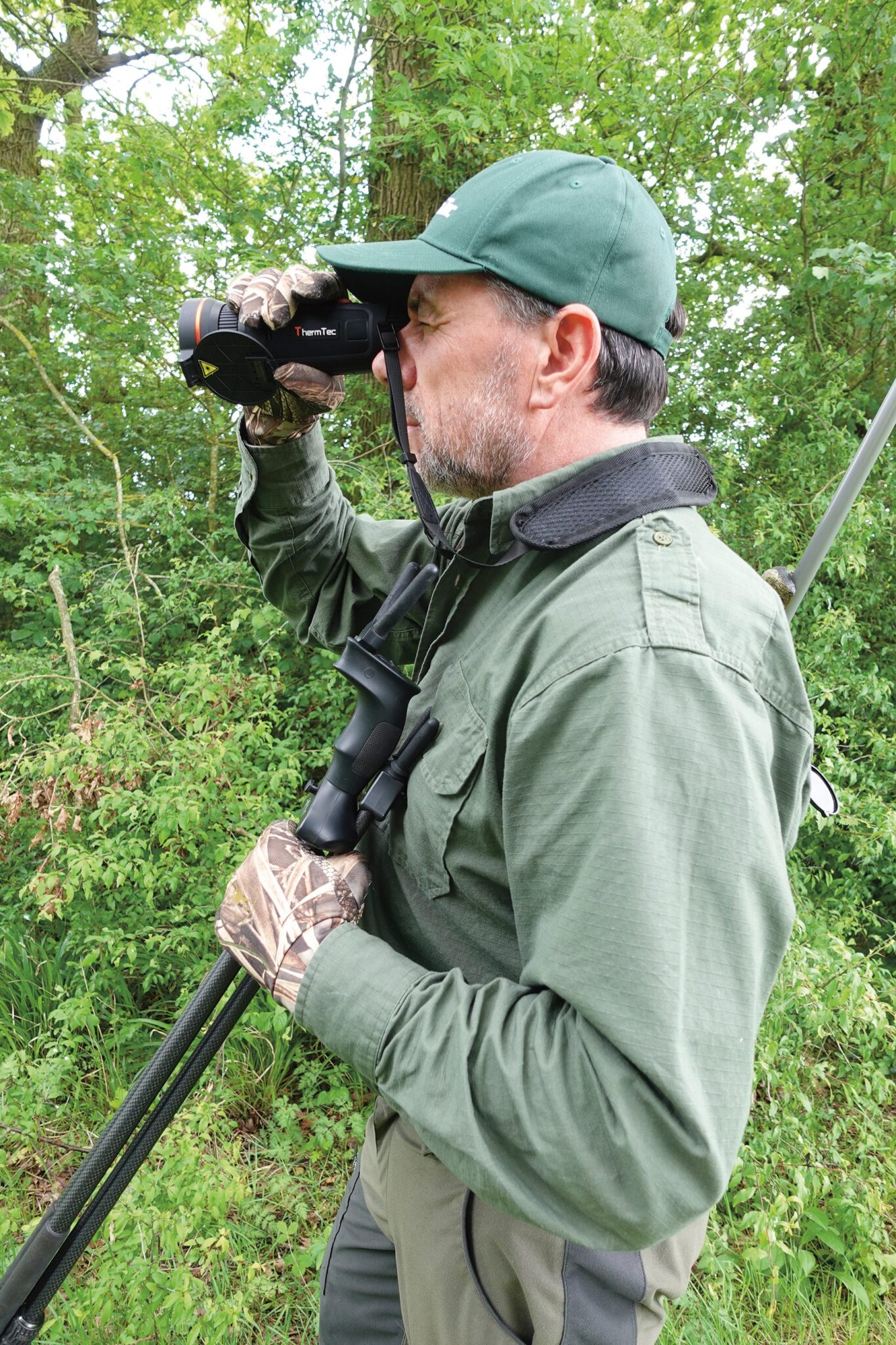 Stalker glassing woodland with the ThermTec Wild 650 DL PRO thermal monocular