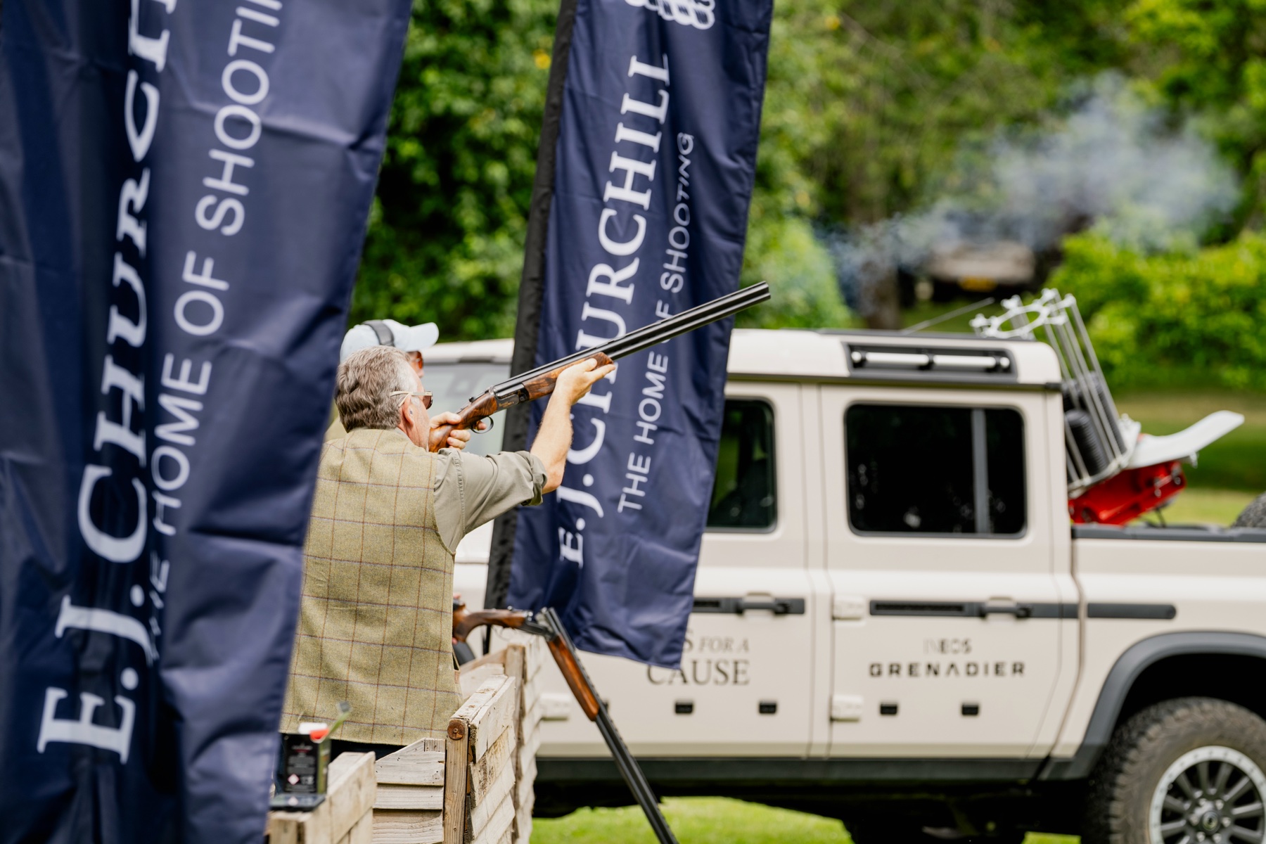 A Gun taking a high bird beside the Clays for a Cause Grenadier