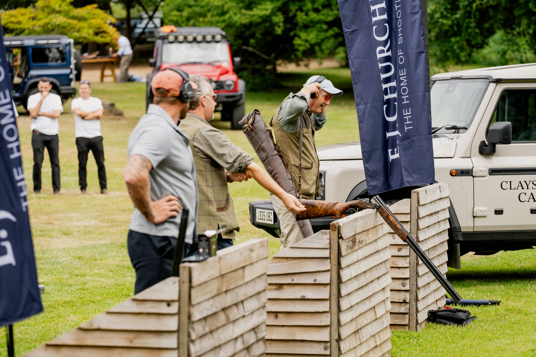 Guns waiting their turn at an E.J. Churchill stand at Clays for a Cause