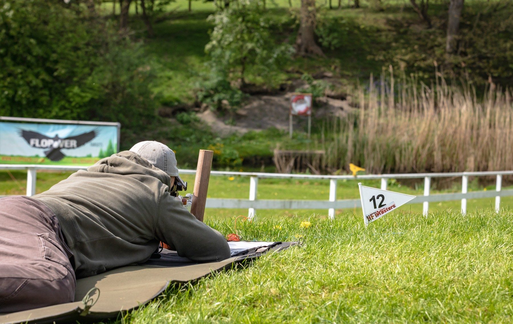 HFT competitor shooting prone from lane 12 at an HFT Masters round