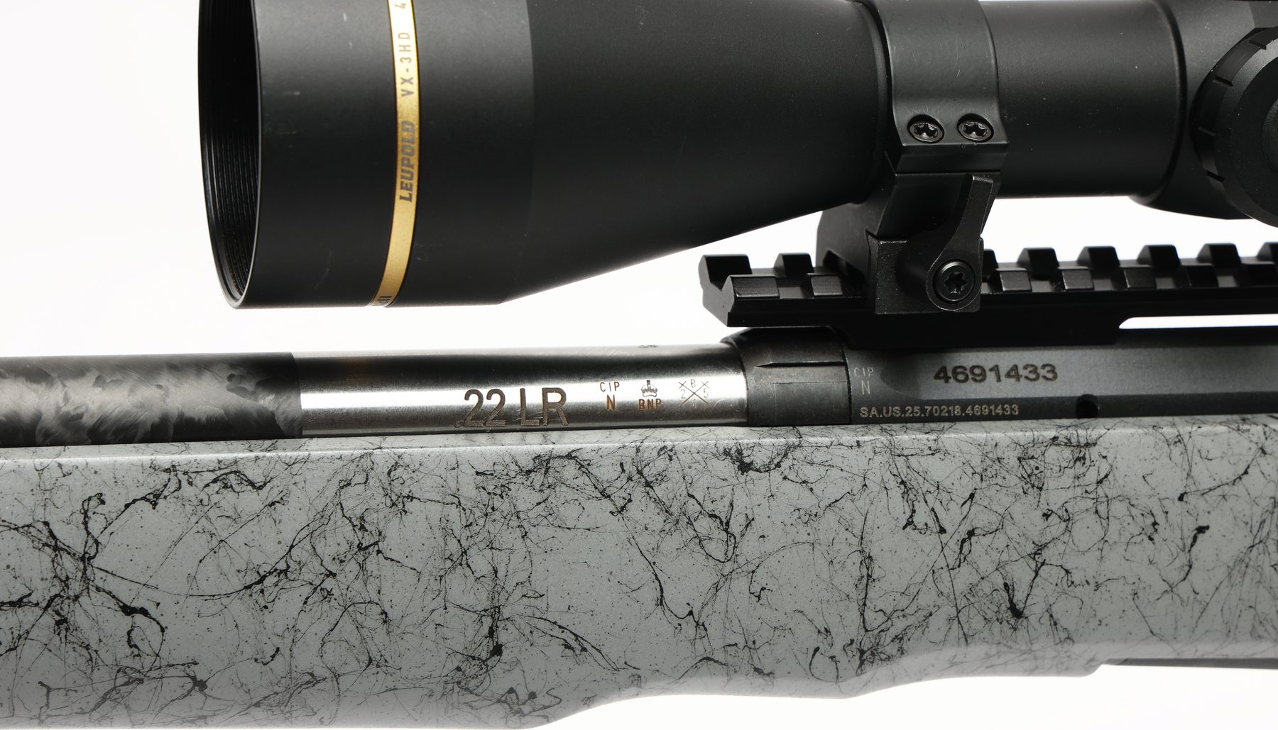 The stainless steel barrel, carbon wrap and knurled headspace nut on the Savage B22 Timberlite