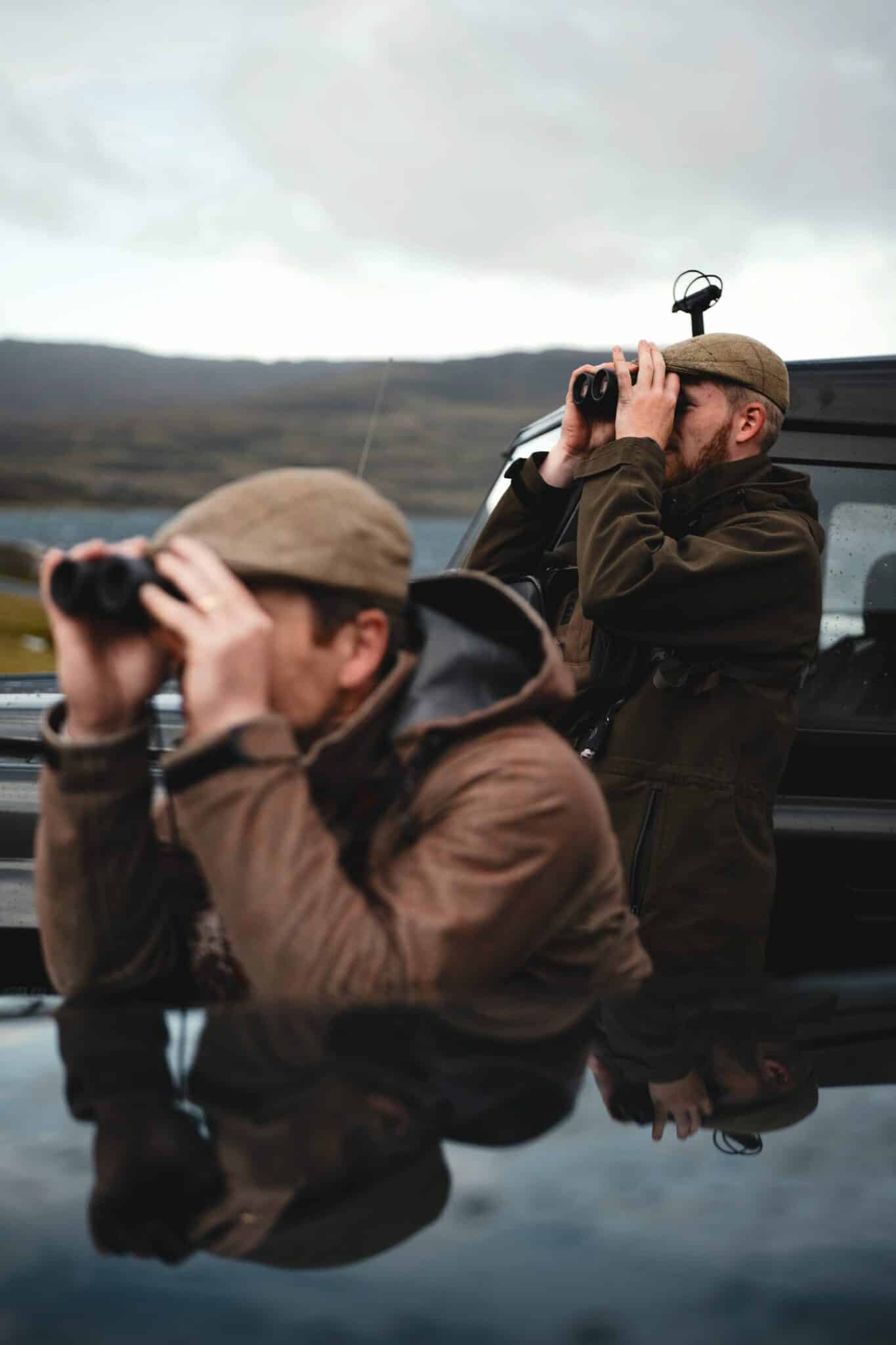 Two stalkers glassing the hills at Benmore Estate in search of red deer