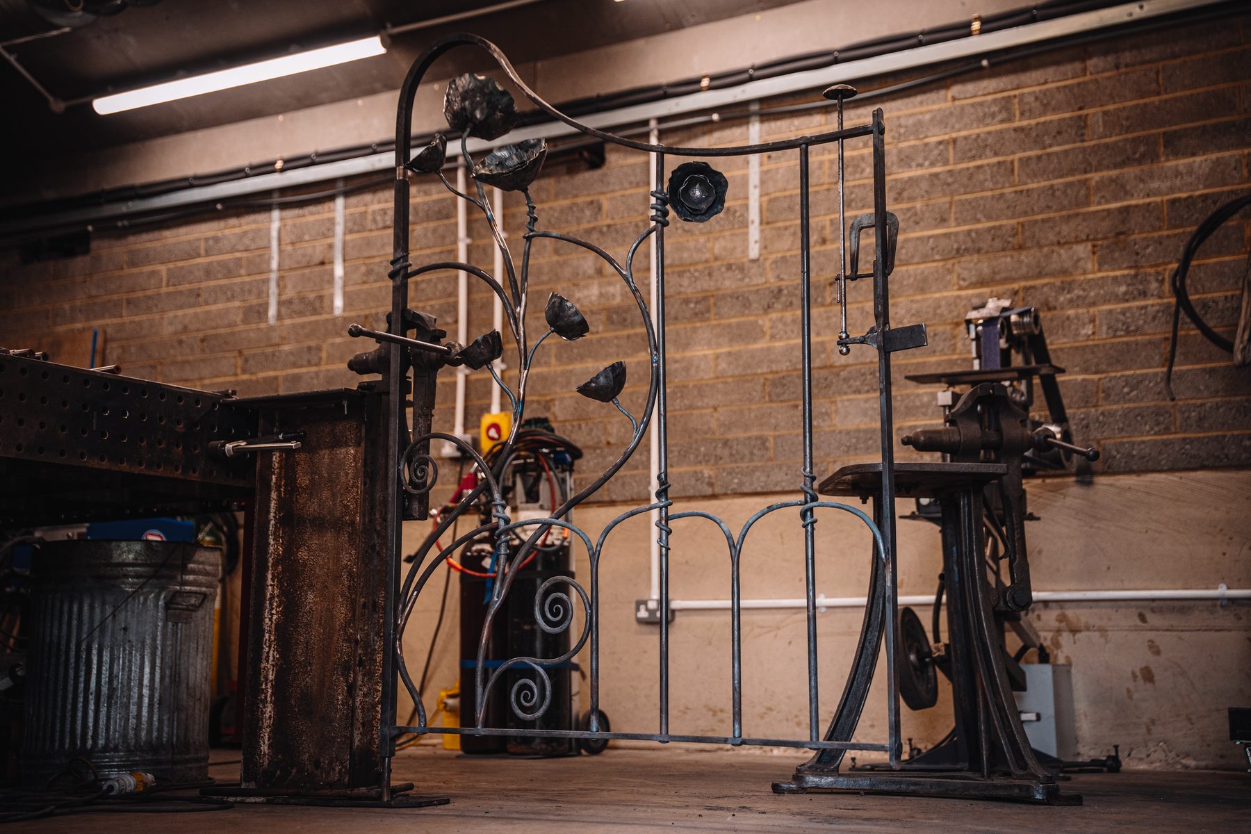 Ornamental iron gates and tools in Toby Smith's Hertfordshire forge