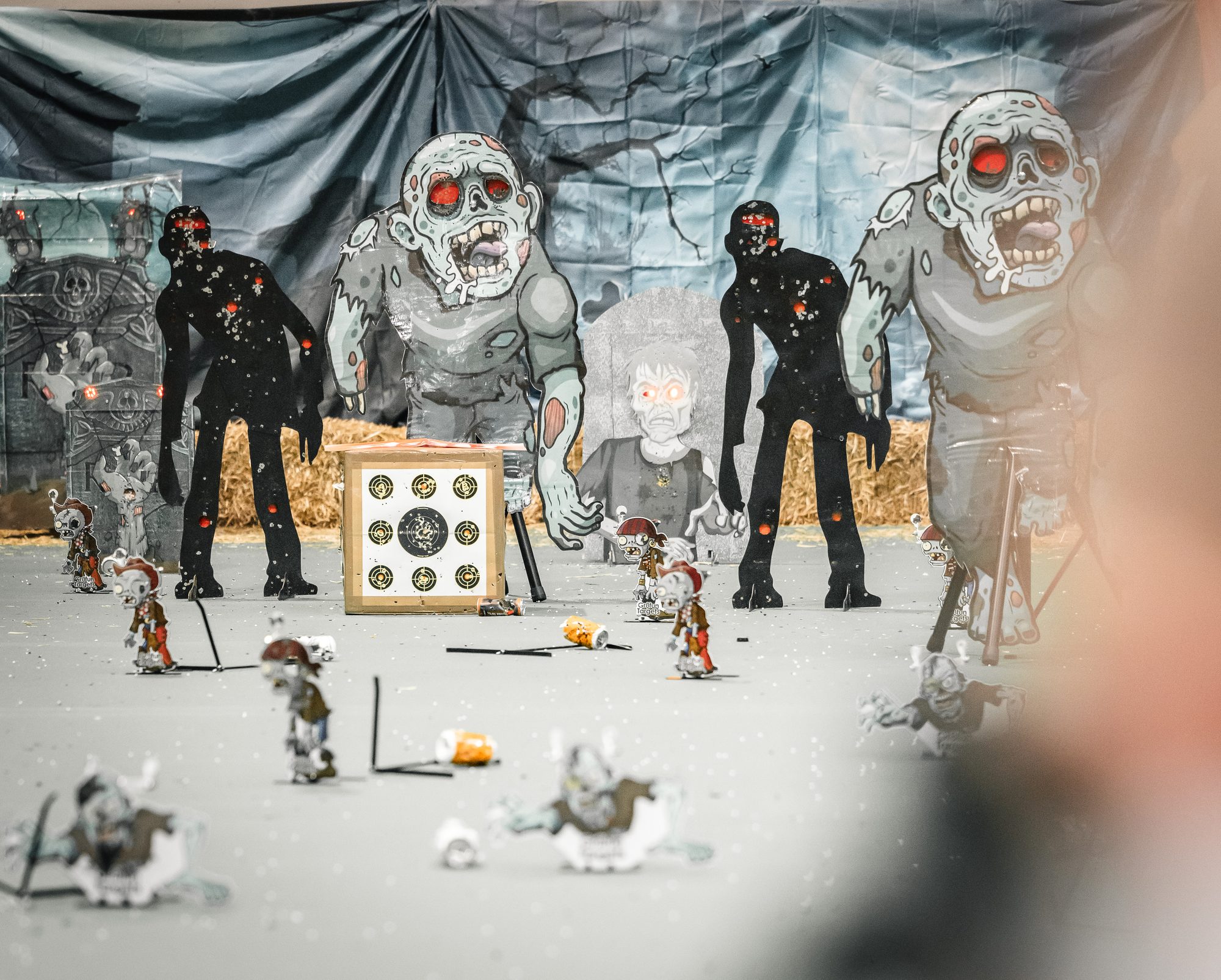 Zombie cut-out targets and small reactive targets set out on the airgun range