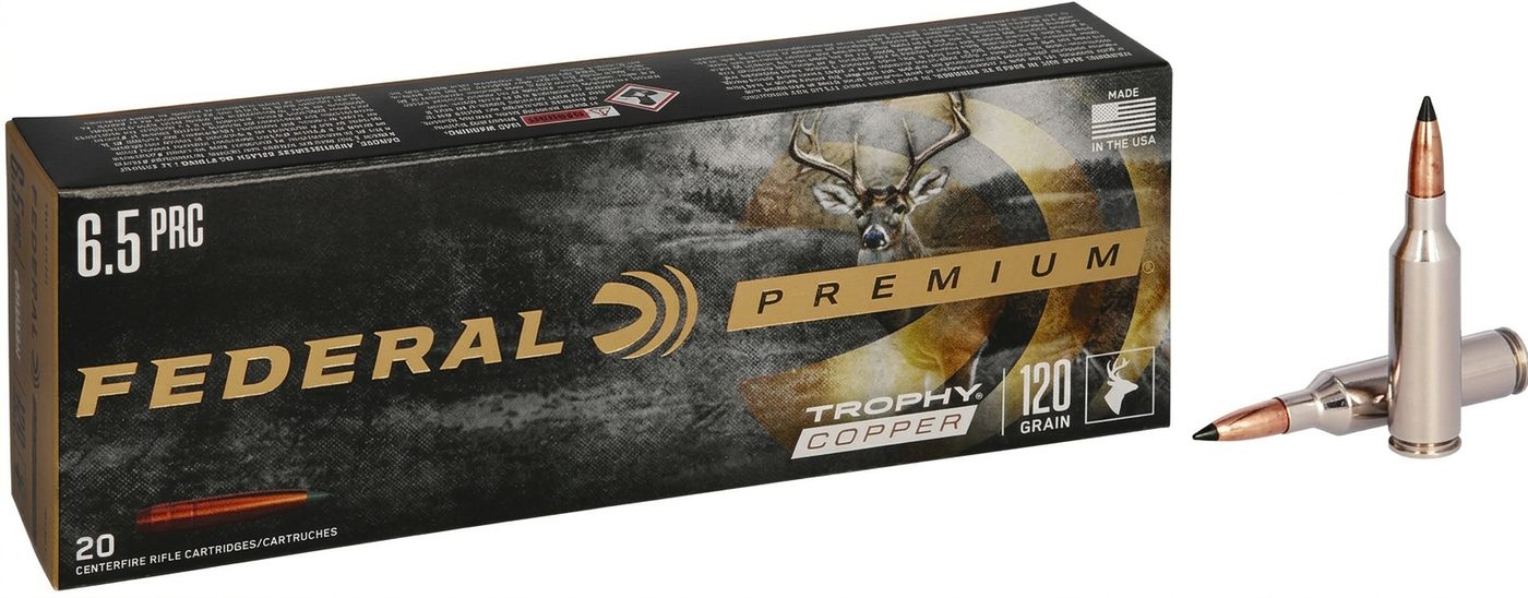 A box of Federal Premium Trophy Copper 6.5 PRC ammunition with a single cartridge