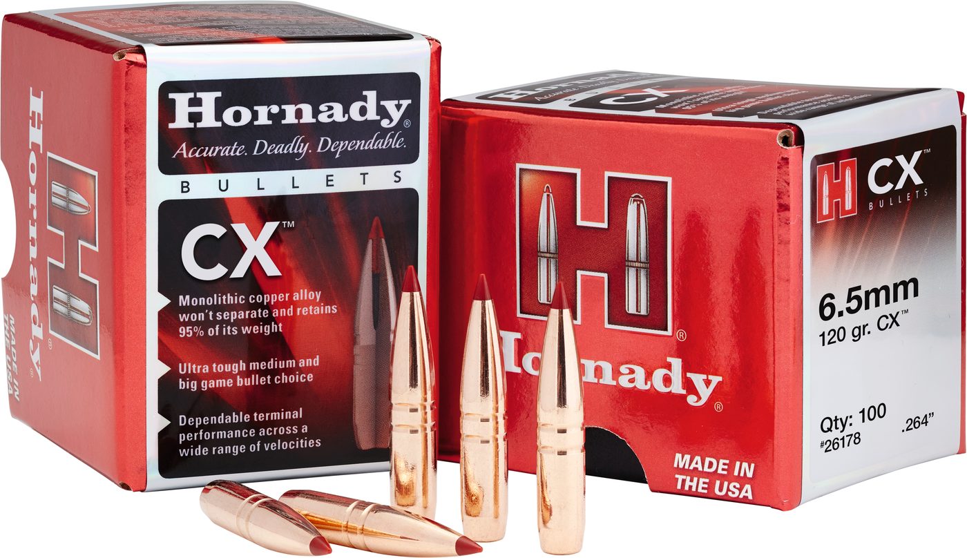 Boxes of Hornady CX 6.5mm 120gr monolithic copper bullets with loose bullets in front