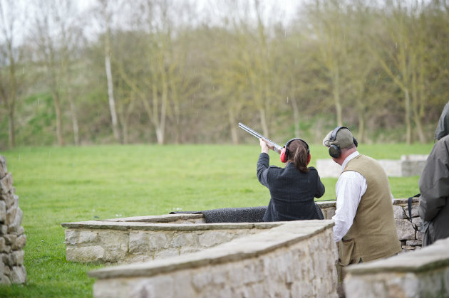 woman learning to shoot